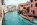 Venice Simplon-Orient-Express luxury train at station with classic blue and gold carriages