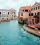 Venice Simplon-Orient-Express luxury train at station with classic blue and gold carriages